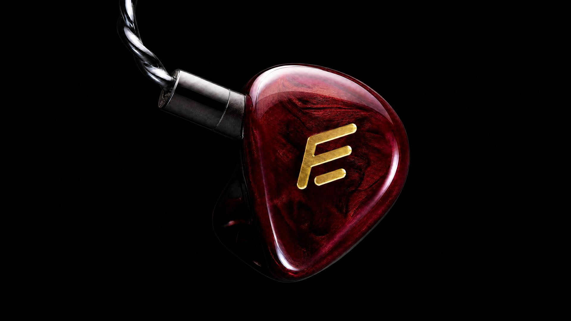 Forma Elyseen Pro FEP03 in deep red wood-swirl finish with gold logo plate